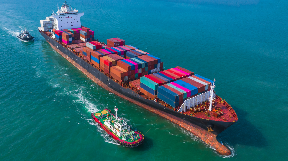 Sea freight logistics service with shipping containers loaded at a commercial port