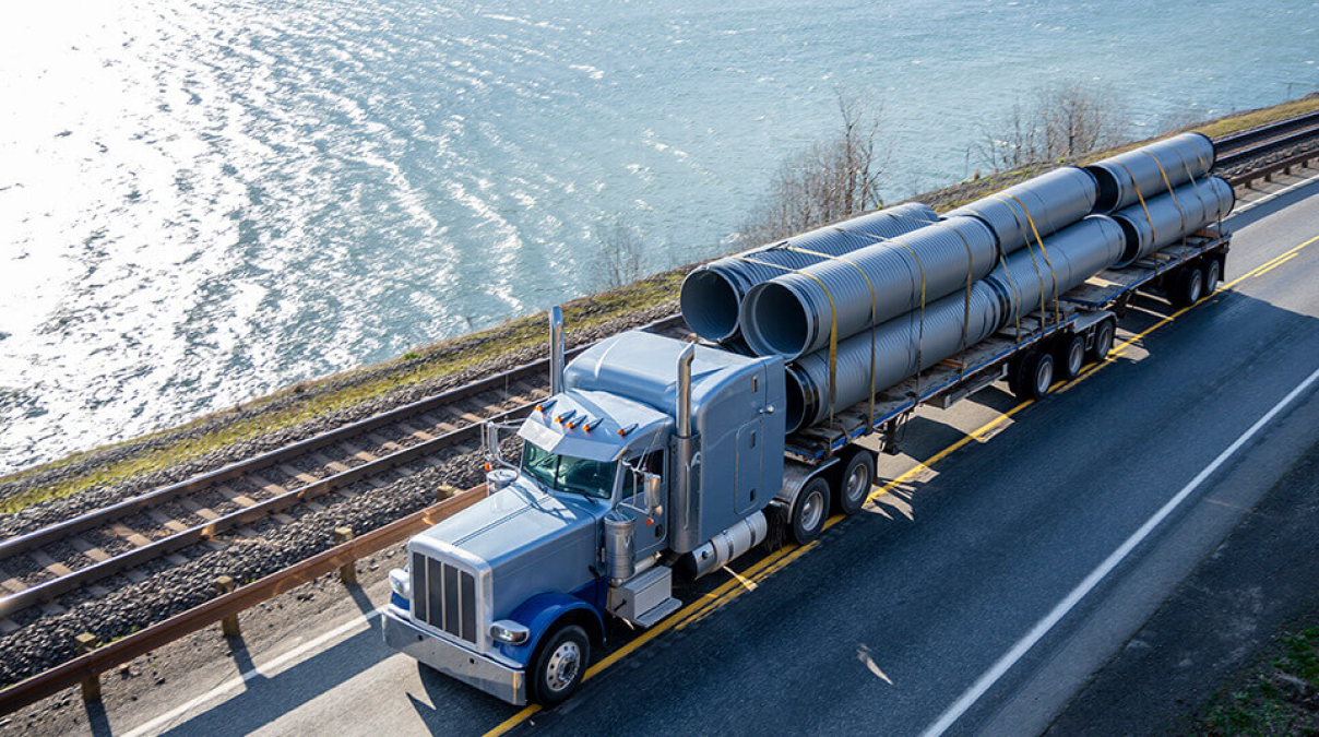 Flatbed Freight Services for heavy machinery and industrial cargo across Canada and the USA