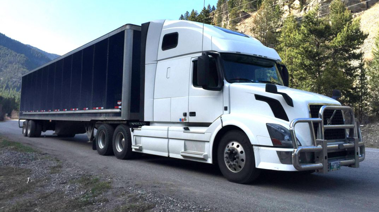 Reliable Ground Freight Trucking Service with a heavy-duty truck hauling freight shipments