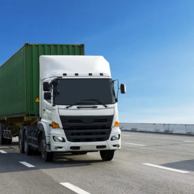 Drayage Trucking Services transporting shipping containers between ports and distribution centers